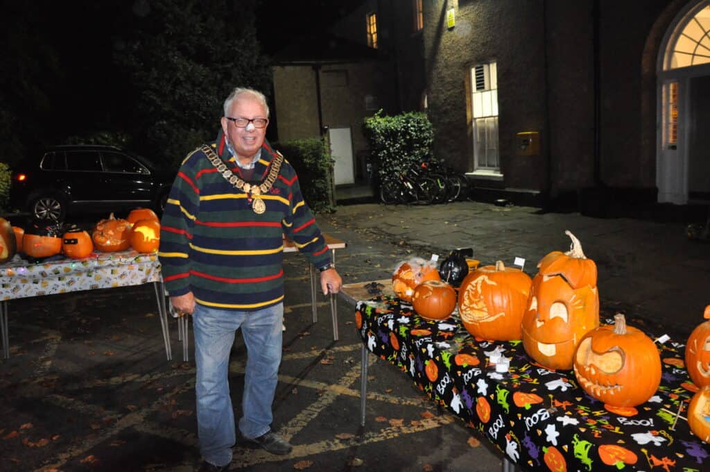 The Mayor of Sedgefield posing beside the adult pumpkin entries