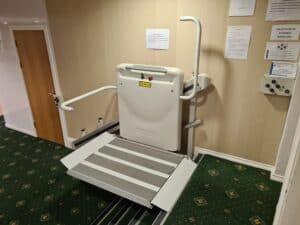 An image of the existing main hall wheelchair lift in the down position.